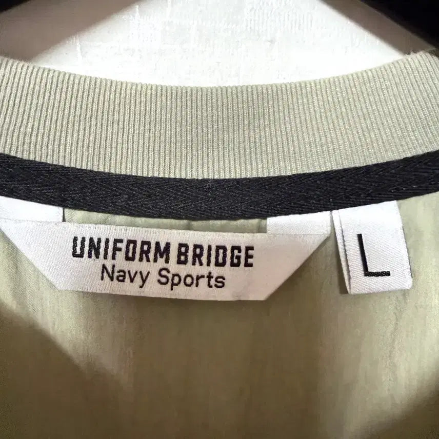 [BUNJANG] Uniform Bridge Warm-up Woven Long Sleeve T-Shirt / [L,100]유니폼브릿지 웜업 우븐 긴팔티 오버핏