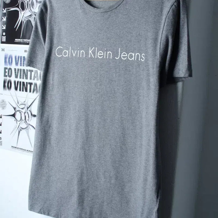 [BUNJANG] Calvin Klein Lettering T-shirt / (L-XL) 캘빈클라인 반팔 티셔츠 레터링 그레이 놈코어-18572