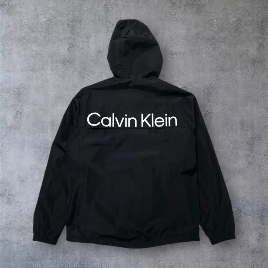 [BUNJANG] Calvin Klein Black Back Logo Hooded Windbreaker Jacket M / 캘빈클라인 블랙 백로고 후드 윈드브레이커 바람막이 M