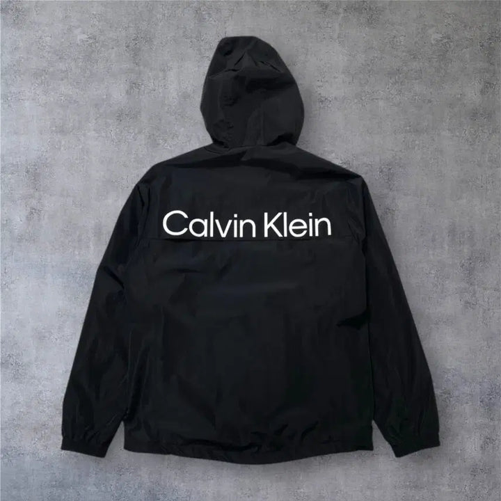 [BUNJANG] Calvin Klein Black Back Logo Hooded Windbreaker Jacket M / 캘빈클라인 블랙 백로고 후드 윈드브레이커 바람막이 M