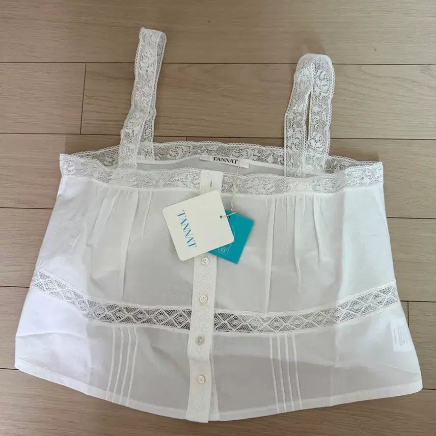 [SOLD OUT] 타낫 슬리브리스 블라우스