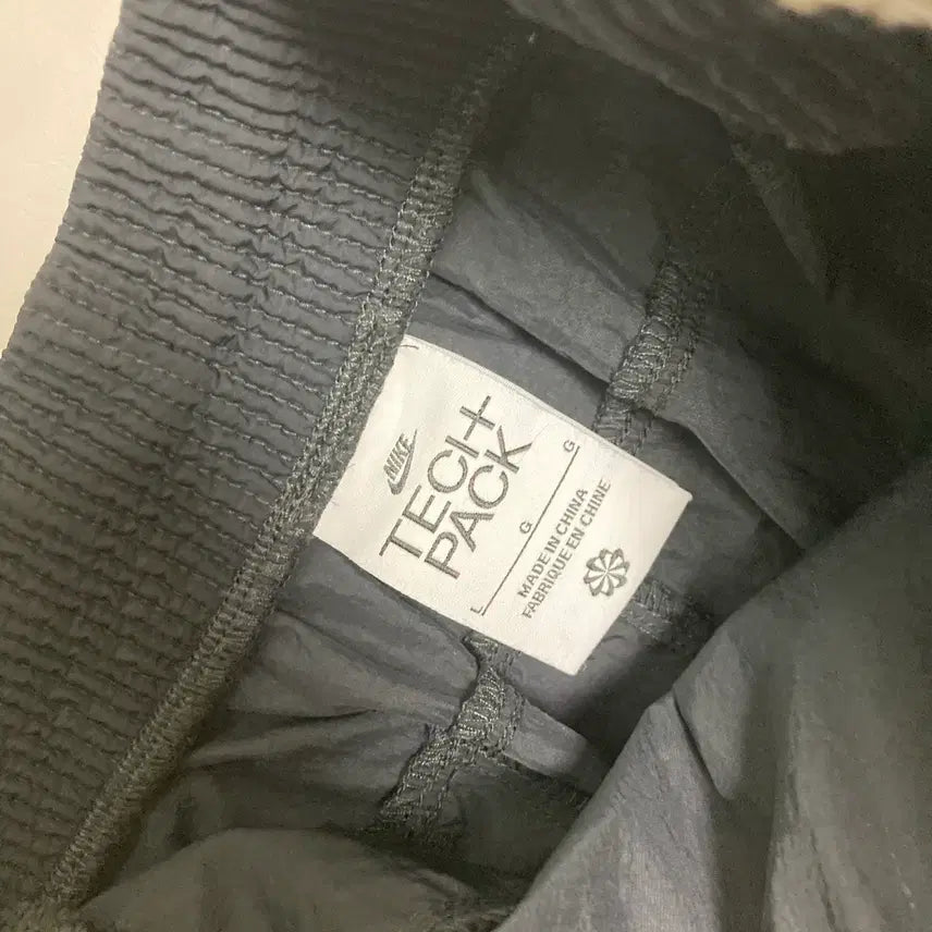 [BUNJANG] Nike Tech Pack Woven Jogger Pants Black L / 나이키 테크팩 우븐 팬츠 조거 블랙 L