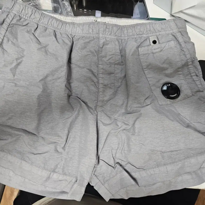 [SOLD OUT] C.P. 컴퍼니 플렛 나일론 스윔 팬츠
