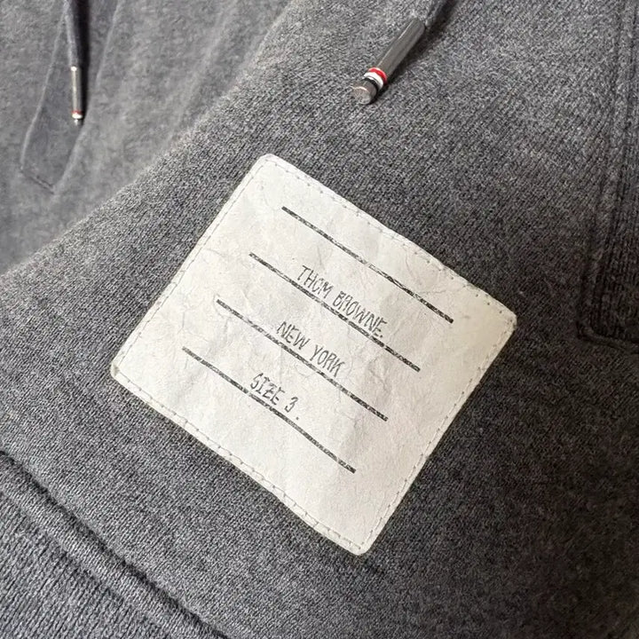 [SOLD OUT] [3] 톰브라운 사선완장 후드집업 다크 그레이