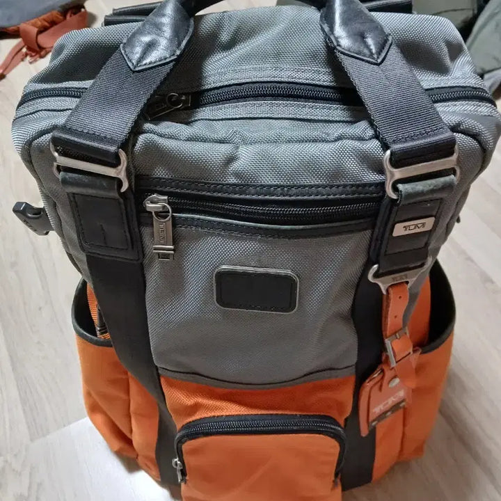 [BUNJANG] TUMI Lejeune Backpack Orange/Gray / TUMI 르준 백팩 오렌지 / 그레이