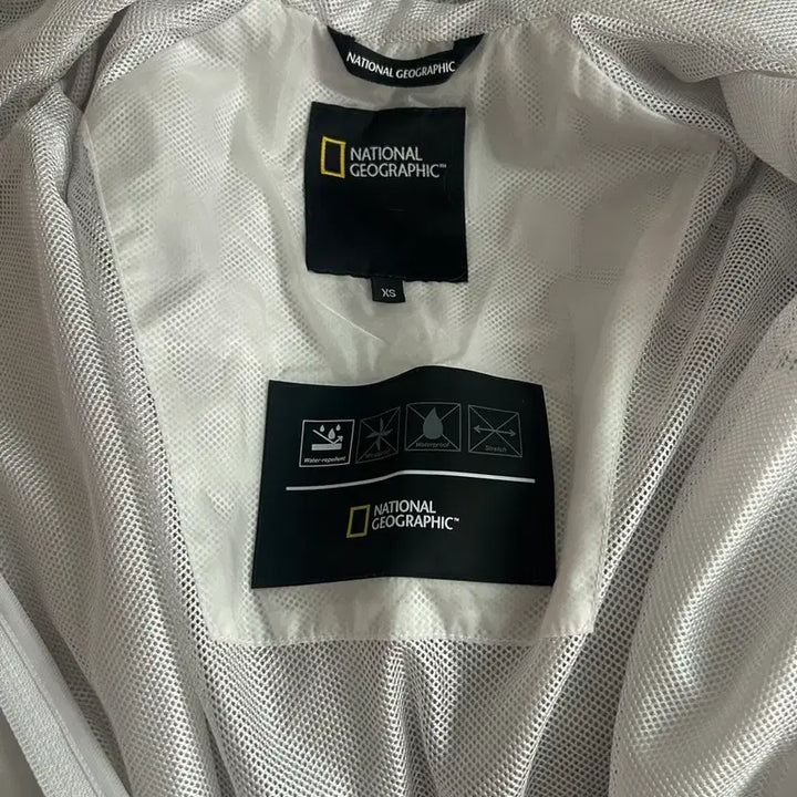 [BUNJANG] National Geographic Windbreaker Jacket XS White / 정품) 내셔널지오그래픽 바람막이 XS 화이트