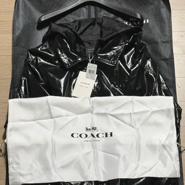 [BUNJANG] Coach Matin Kim Coated Hooded Jumper / 코치 마뗑킴 코팅 후드 점퍼 블랙