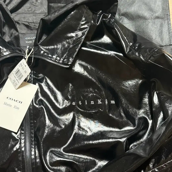 [BUNJANG] Coach Matin Kim Coated Hooded Jumper / 코치 마뗑킴 코팅 후드 점퍼 블랙