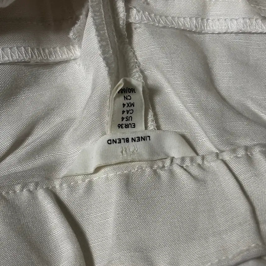 [BUNJANG] H&amp;M Linen White Tucked Tapered Pants / H&amp;M 린넨 화이트 핀턱 테이퍼드 팬츠