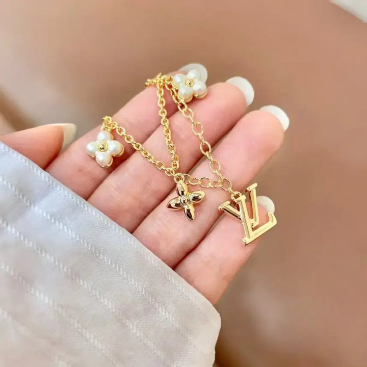 [BUNJANG] Louis Vuitton Gold Flower Charm Bracelet / 루이비통 골드 플라워 참 팔찌