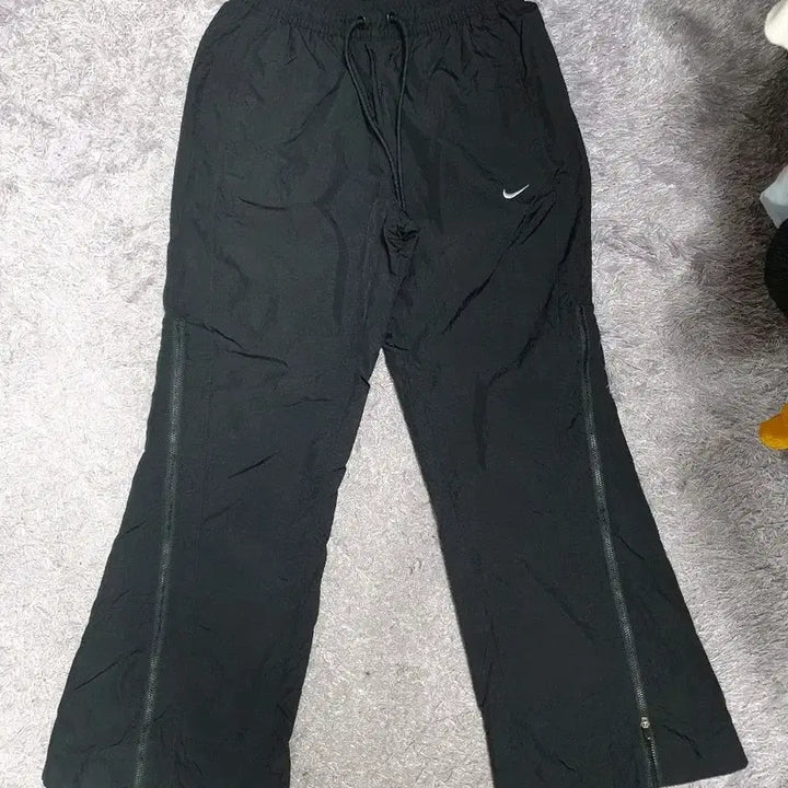 [BUNJANG] Nike Mid-Rise Repel Zipper Bootcut Woven Pants - Black (S) / 나이키 바지 미드라이즈 리펠 지퍼 부츠컷 우븐 팬츠 블랙 s