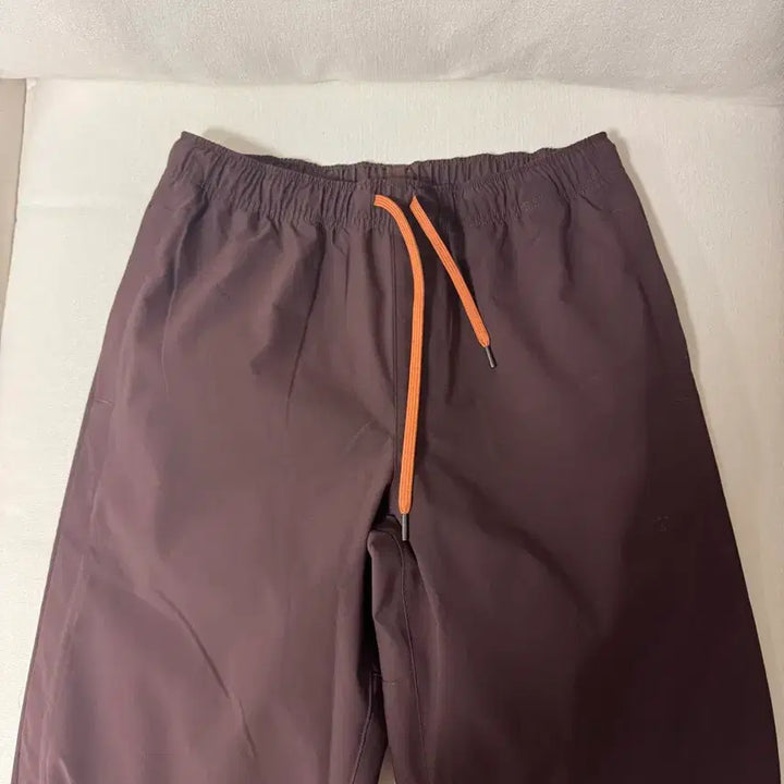 [BUNJANG] Uniqlo JW Anderson Track Pants Brown / (M)유니클로 jwa앤더슨 트랙팬츠 브라운