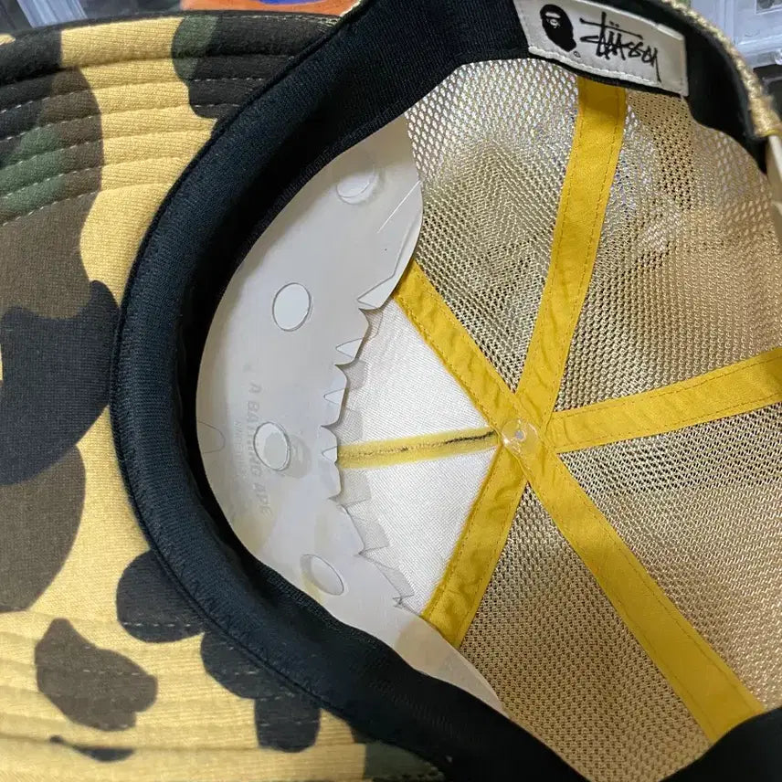 [BUNJANG] Stussy x Bape Camo Trucker Cap Yellow / [F] 스투시 x 베이프 카모 트러커캡 옐로우