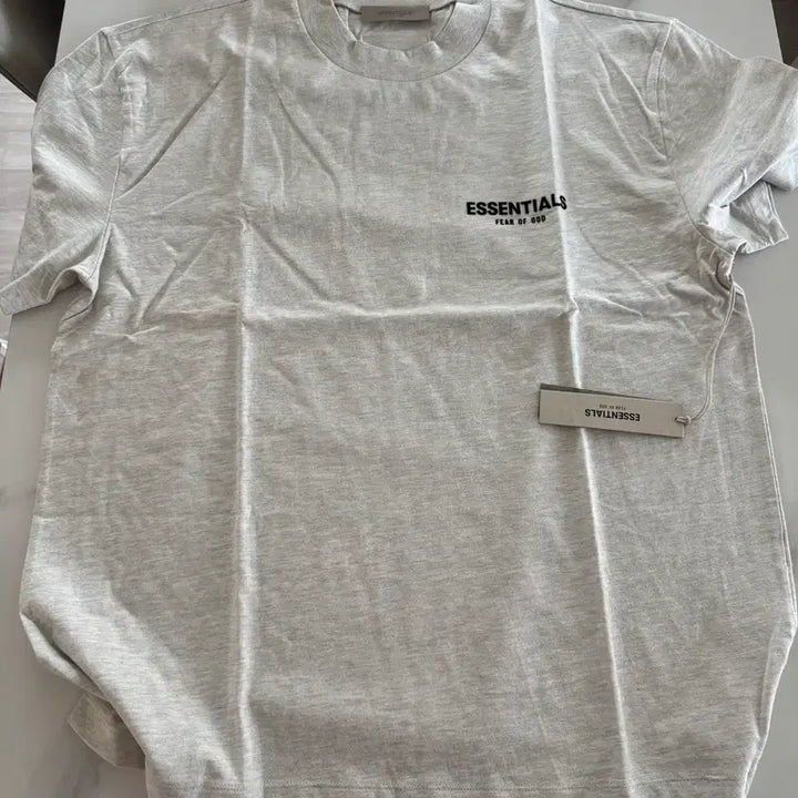 [BUNJANG] Fear of God Essentials Light Oatmeal Short Sleeve T-shirt / 피오갓 에센셜 라이트오트밀 반팔 L 새상품