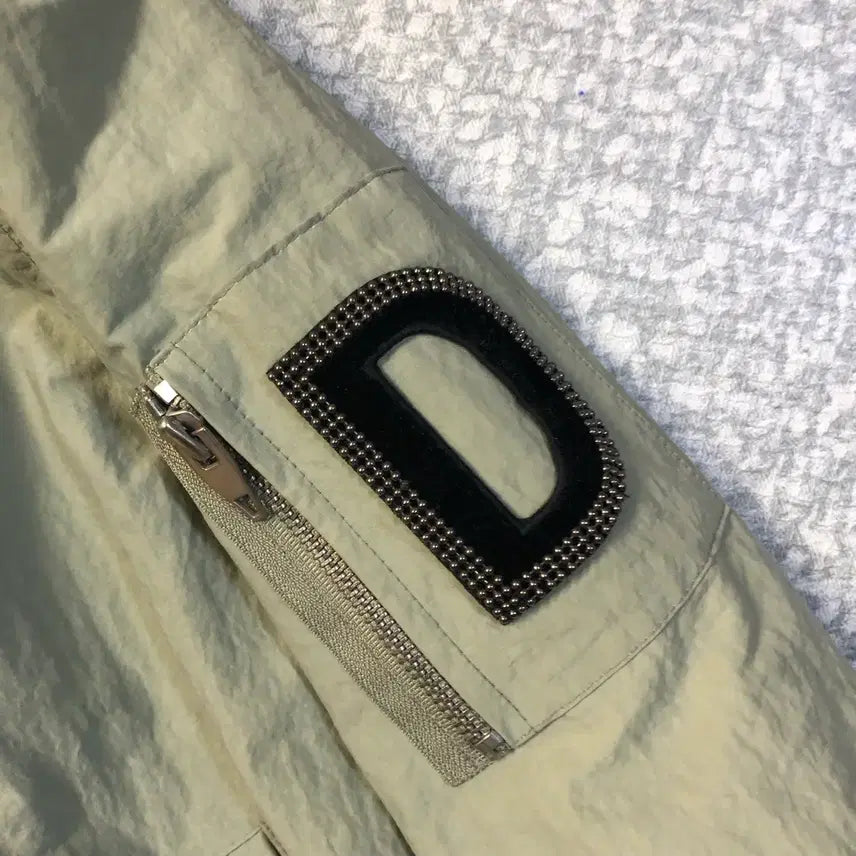 [SOLD OUT] 듀엘 바스락 카키 레터링 봄버 자켓 재킷 바람막이 간절기 점퍼