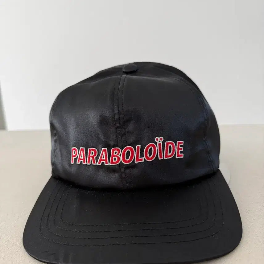 [BUNJANG] Paraboloide Satin Logo Cap Black / 파라볼로이드사틴 로고 캡 블랙
