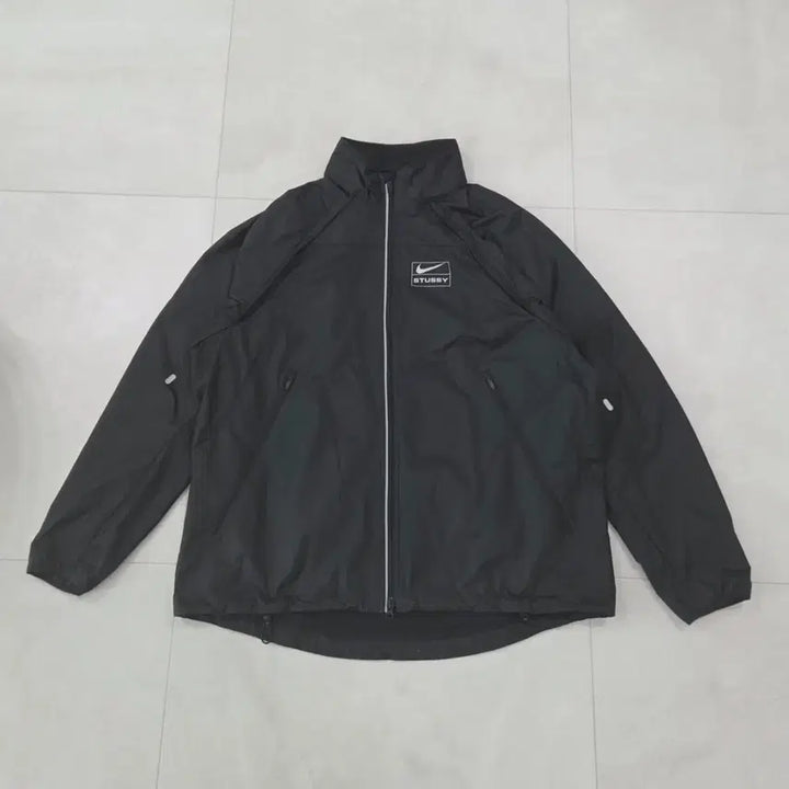[SOLD OUT] [L] 나이키 x 스투시 NRG FL 스톰핏 자켓 블랙 바람막이