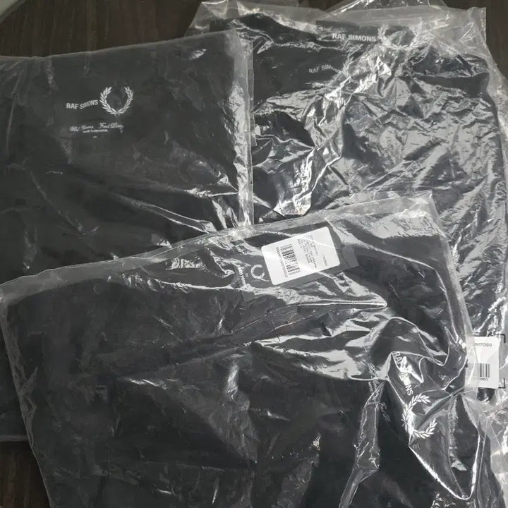 [BUNJANG] Raf Simons Fred Perry Black T-Shirt / 라프시몬스 프레드페리 콜라보 블랙 티셔츠