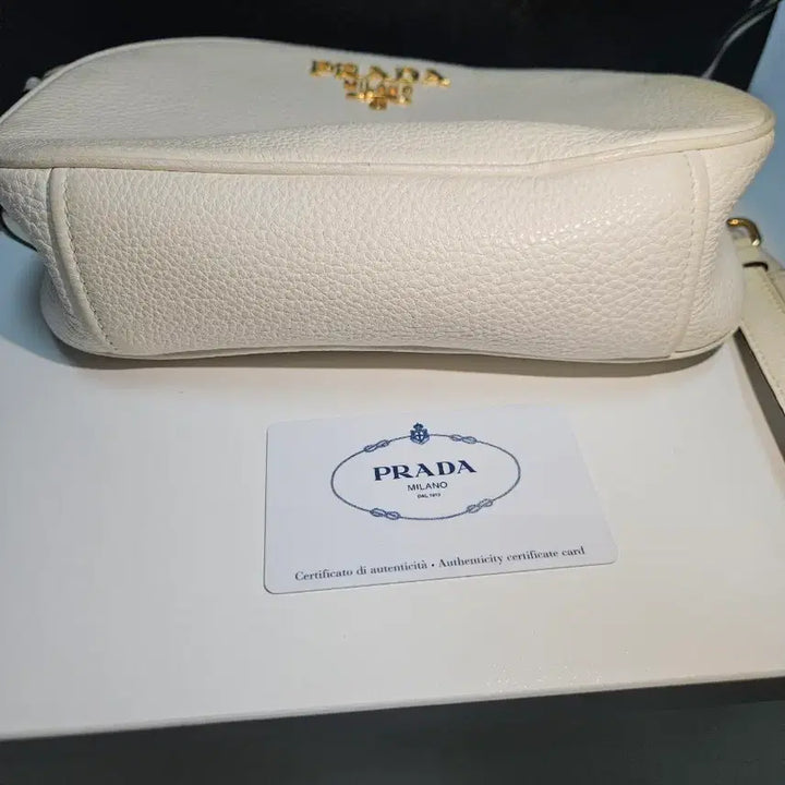 [BUNJANG] Prada Vitello Daino Leather Bandoliera Round Crossbody Bag / 프라다 화이트 비텔로 다이노 레더 반돌리에라 라운드 크로스백