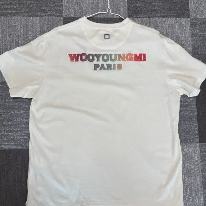 [BUNJANG] Wooyoungmi Fuzzy Ivory T-shirt / (한정판) 우영미 퍼지 레인보우 백로고 반팔 46