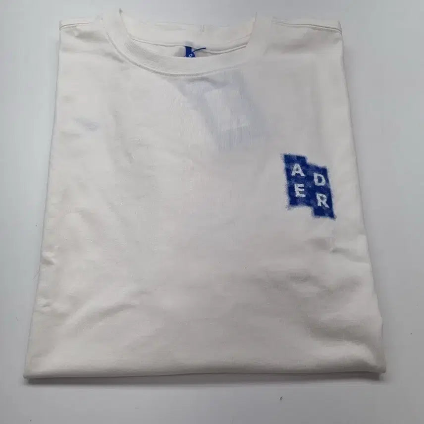 [SOLD OUT] 아더에러 시그니피컨트 TRS 태그 티셔츠 04 오프 화이트