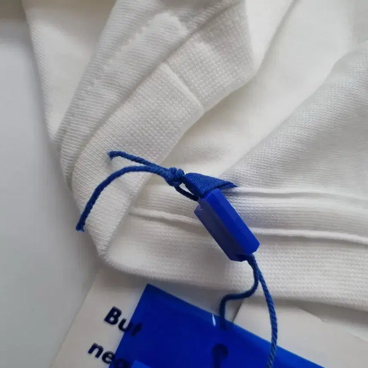 [SOLD OUT] 아더에러 시그니피컨트 TRS 태그 티셔츠 04 오프 화이트