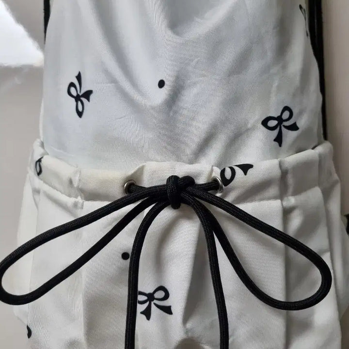 [BUNJANG] Ribbon Pattern White Drawstring Backpack / 리본 패턴 화이트 드로우스트링 백팩