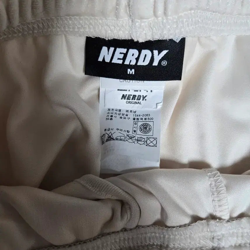[BUNJANG] Nerdy DNA Block Velvet Track Pants Cream / 널디(Nerdy) DNA 블록 벨벳 트랙 팬츠 크림 색상