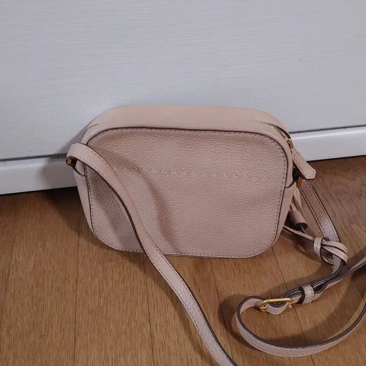 [BUNJANG] Tory Burch Logo Embossed Leather Crossbody Bag with Tassel Accent / 토리버치 크로스백