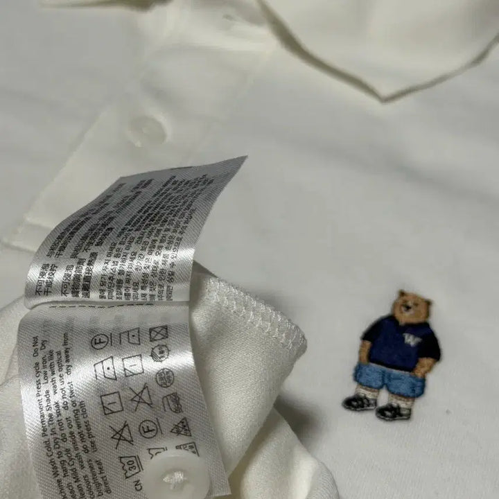 [BUNJANG] WHO.A.U Bear Embroidery Short-Sleeve Polo Shirt Ivory / WHO.A.U 곰돌이 자수 반팔 폴로티 아이보리
