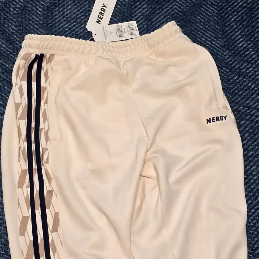 [BUNJANG] NERDY Cream Track Pants / [새상품] 널디 NERDY 트랙 바지 크림