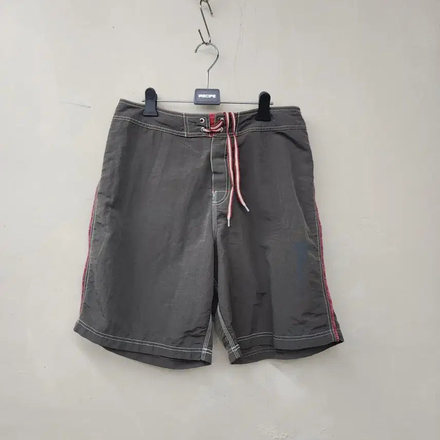 [BUNJANG] Stussy Logo Side Stripe Shorts / 스투시 반바지