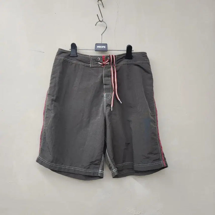 [BUNJANG] Stussy Logo Side Stripe Shorts / 스투시 반바지