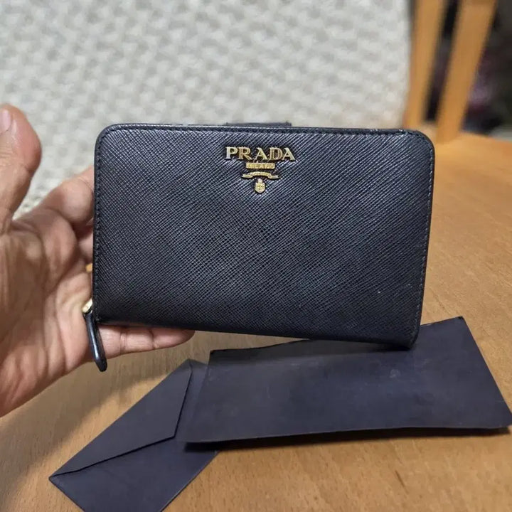 [BUNJANG] Prada Saffiano Leather Bifold Wallet Black / 프라다 사피아노 반지갑 블랙 정품