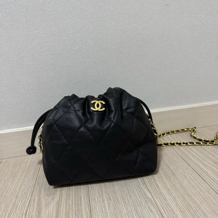 [BUNJANG] CC Logo Reform Drawstring Pouch Bag / CC 로고 리폼 드로스트링 파우치백