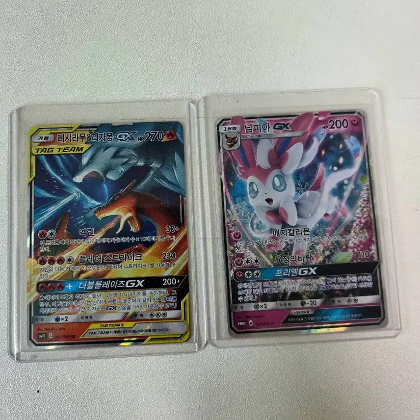 [SOLD OUT] 레시라무&amp;리자몽 태그팀 GX / 님피아 한정 프로모 GX 카드