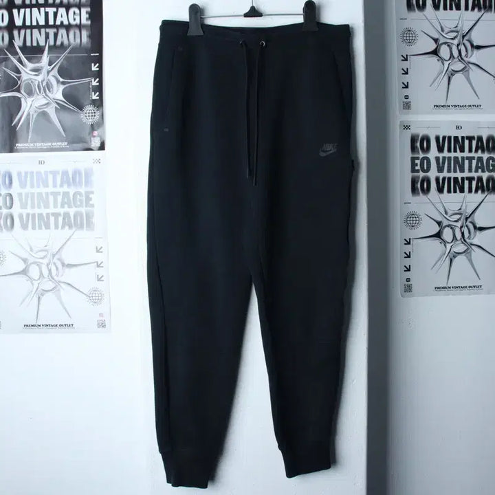 [BUNJANG] Nike Tech Pack Jogger Pants Black / (L-XL) 나이키 트레이닝복 바지 테크팩 조거 블랙 스트릿-2611