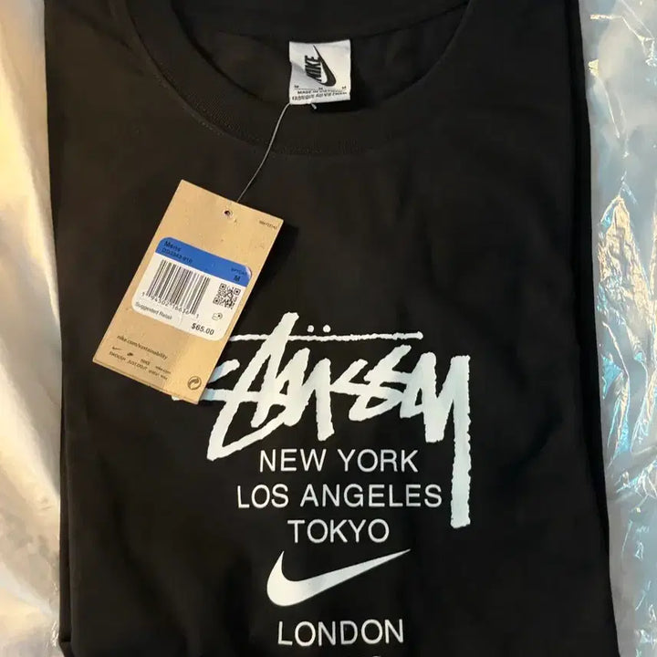 [BUNJANG] Stussy Nike Style World Tour T-Shirt / 스투시나이키 스타일 반팔티셔츠 월드투어