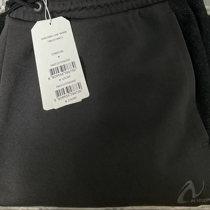 [BUNJANG] NERDY Diagonal Denim Track Pants Charcoal / 널디 다이애그널 데님트랙팬츠(새상품)