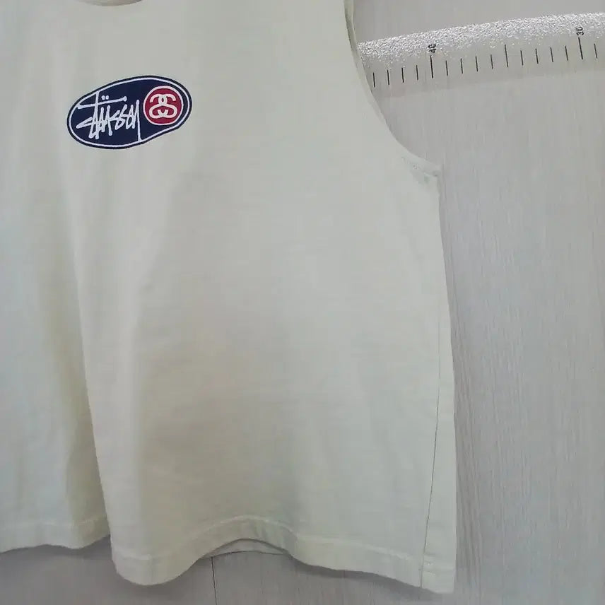 [BUNJANG] Stussy Oval Logo Tank Top Ivory / 스투시 나시티 아이보리색 오벌 로고