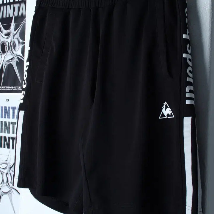 [BUNJANG] Le Coq Sportif Lettering Shorts Black Old School / W(L) 르꼬끄 반바지 팬츠 레터링 블랙 올드스쿨-25B8