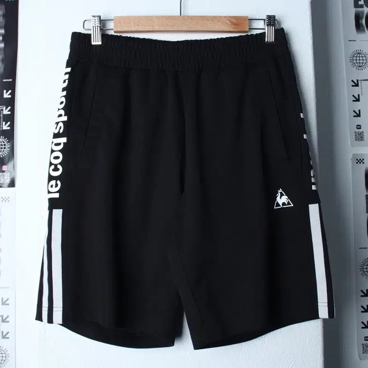 [BUNJANG] Le Coq Sportif Lettering Shorts Black Old School / W(L) 르꼬끄 반바지 팬츠 레터링 블랙 올드스쿨-25B8