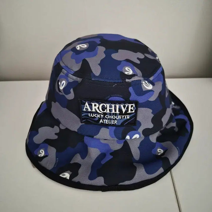 [BUNJANG] Lucky Chouette Archive Camouflage Bucket Hat / [럭키슈에뜨] 아카이브 카모플라쥬 버킷햇