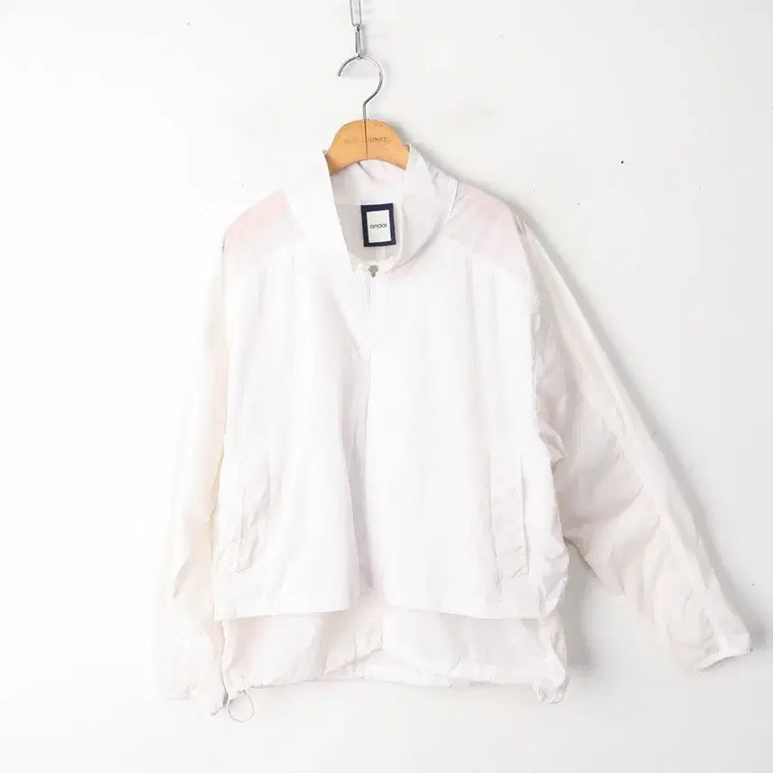 [SOLD OUT] 55/안다르 클리어 페더 윈드자켓