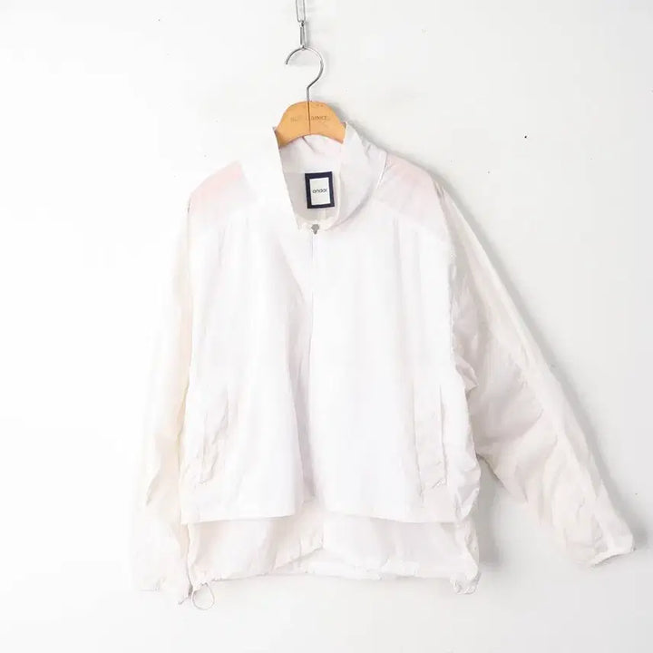 [SOLD OUT] 55/안다르 클리어 페더 윈드자켓