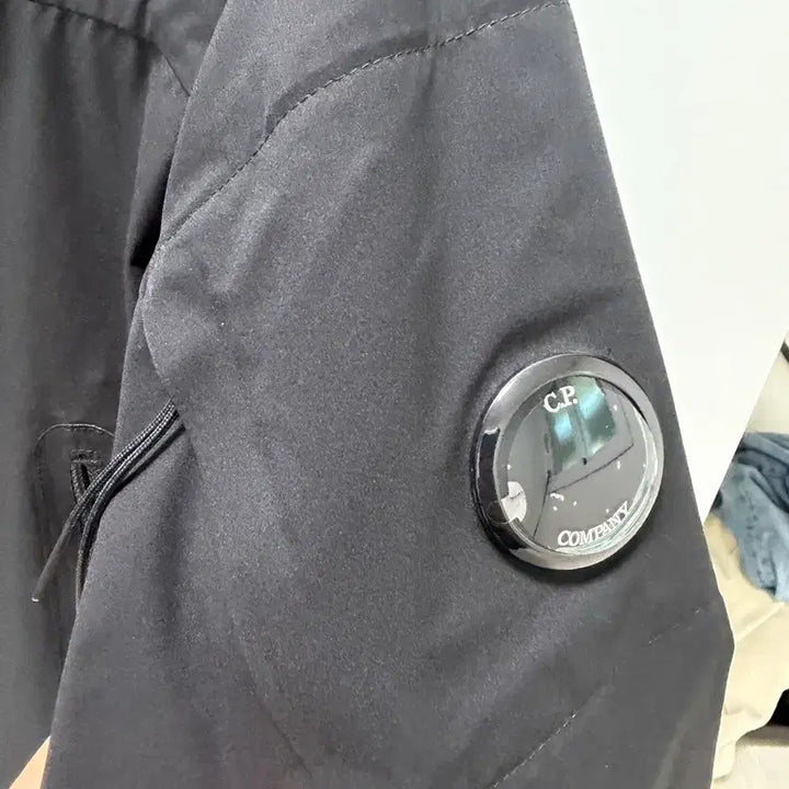 [BUNJANG] CP Company Pro-Tek Lens Windbreaker Jacket Black / CP컴퍼니 프로텍 렌즈 바람막이 자켓 블랙 105