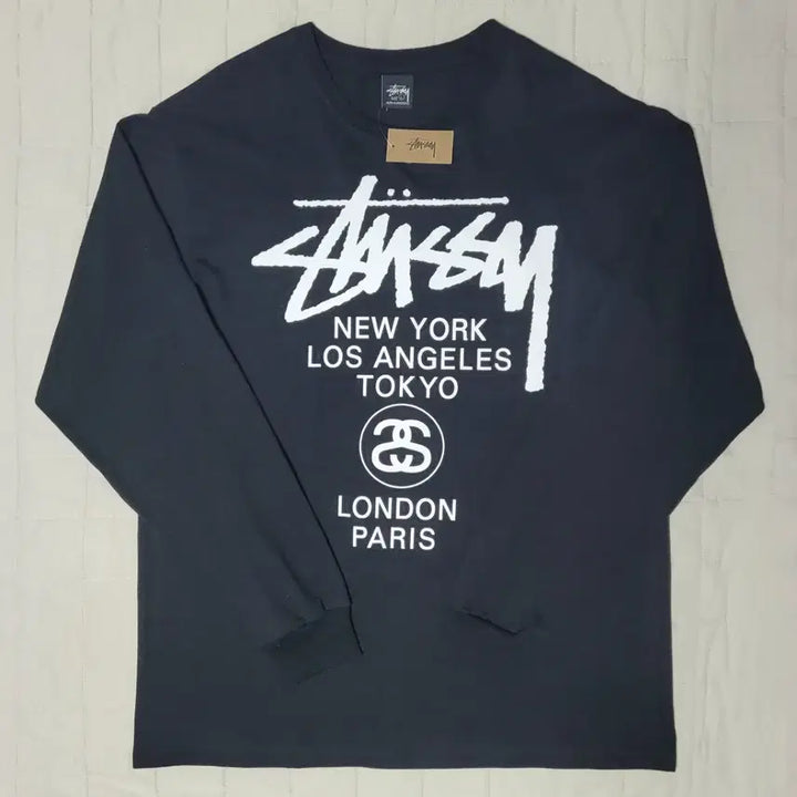 [BUNJANG] Stussy World Tour Long Sleeve T-Shirt White/Black XL / [새 상품] 스투시 월드투어 화이트/블랙 롱슬리브 XL