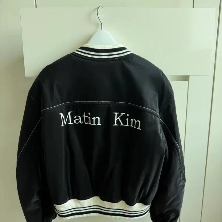 [BUNJANG] Matinkim Coated Stadium Jumper Black / 마뗑킴 코팅 스타디움 점퍼 블랙