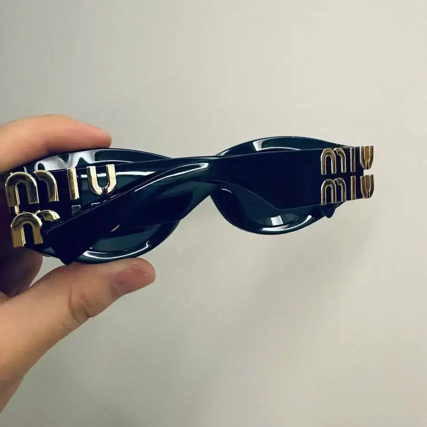 [BUNJANG] Miu Miu Black Oval Sunglasses / 미우 미우 트렌디한 블랙 타원형 선글라스