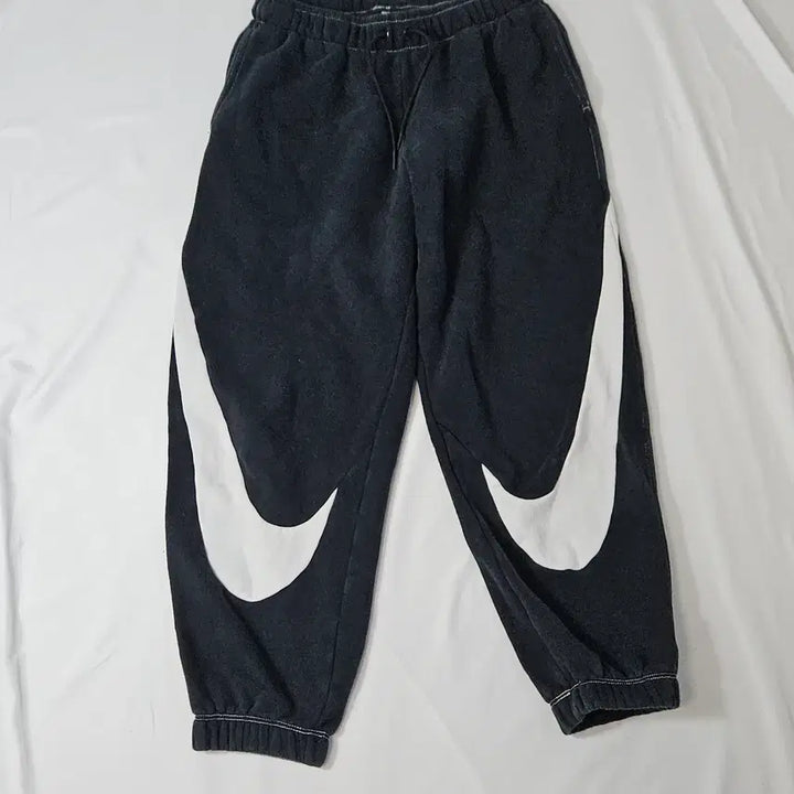 [BUNJANG] Nike Big Swoosh Pleats Jogger Pants (Women&